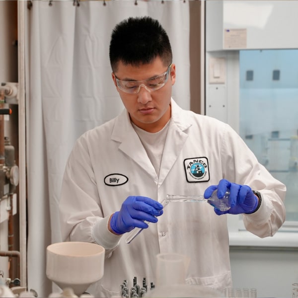 Manitobans working in a science lab